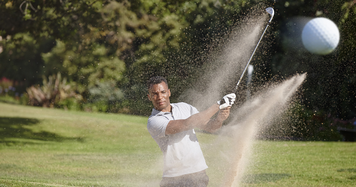 man playing golf